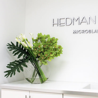 Lunar Vase with Green Cymbidiums and Callas
